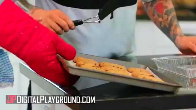 Khloe Kapri with Small Hands baking cookies in kitchen