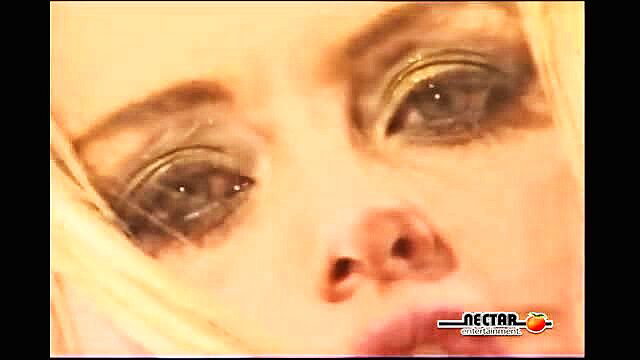 Brittney Skye and Nicole Sheridan closeup eyes lips lesbian tease