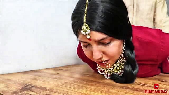 Mia Park in bridal lehenga kneels submissively, heavy jewelry, Filmy Fantasy