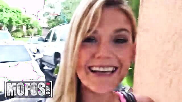 Blonde Hope Harper smiles outside in pink top - MOFOS