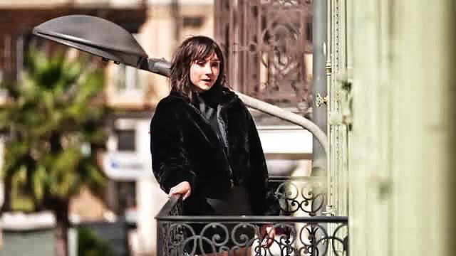 Abby 23yo graphic designer in Vannes on balcony in fur coat