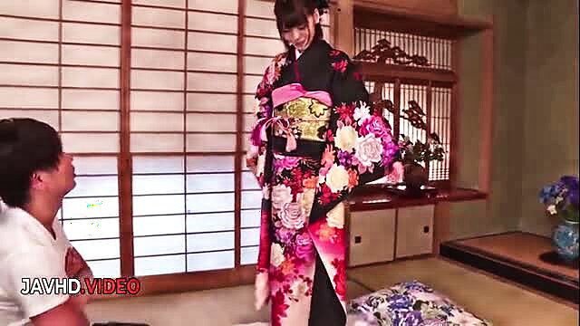 Seductive Japanese kimono woman teases man passionately