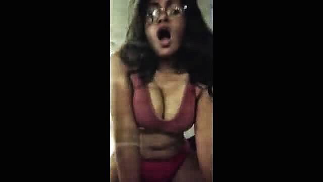 Hot Tamil girl in red bikini top with big tits, shocked expression, amateur tease