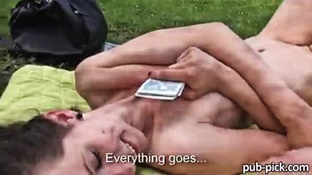 Samantha Bentley nude outdoors, smiling with phone held to chest