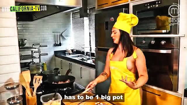 Clara Wellen cooking topless in sexy yellow apron and chef hat