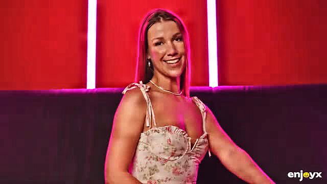 Angelique Lapiedra smiles in floral dress, EnjoyX studio