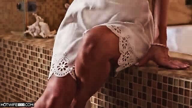 Kayla Kayden in sexy lace lingerie sitting on tub edge