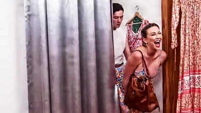 Horny MILF laughs as younger guy peeks at her in changing room