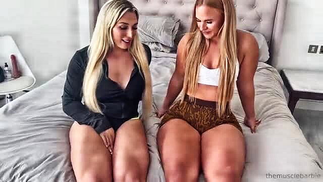 Two busty blonde fitness babes in lingerie tease on bed