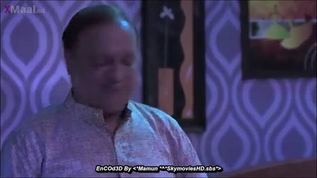 Mature Indian man in shiny kurta smiles seductively