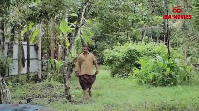 Horny Indian MILF in lungi walks in lush jungle outdoors