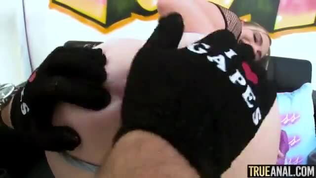 Petite blonde Rhyder's huge tits grabbed in black gloves closeup