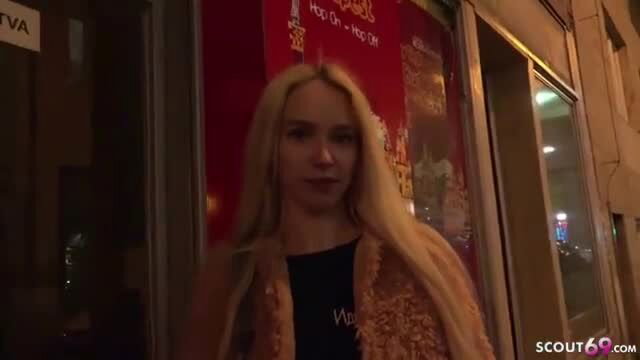 Skinny blonde Arteya in sexy fur coat street casting by German Scout