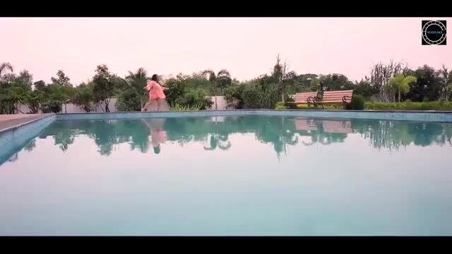 Indian BBW in pink dress running by pool, lustful tease