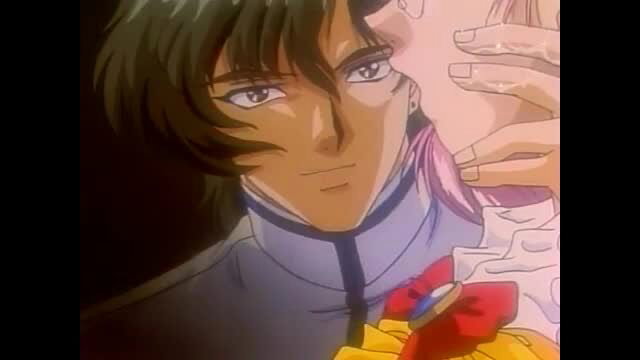 Isaku vol.1 hentai closeup of anime guy kissing pink-haired girl passionately