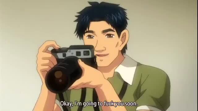 Handsome young Asian man with camera smiles confidently in JAV scene