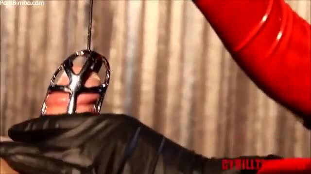 Cybill Troy in latex gloves teases cock with metal chastity cage