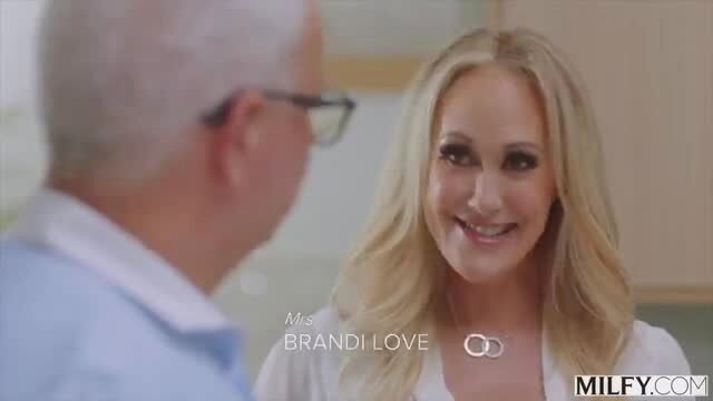 Brandi Love smiling at older man in kitchen, hot MILF tease