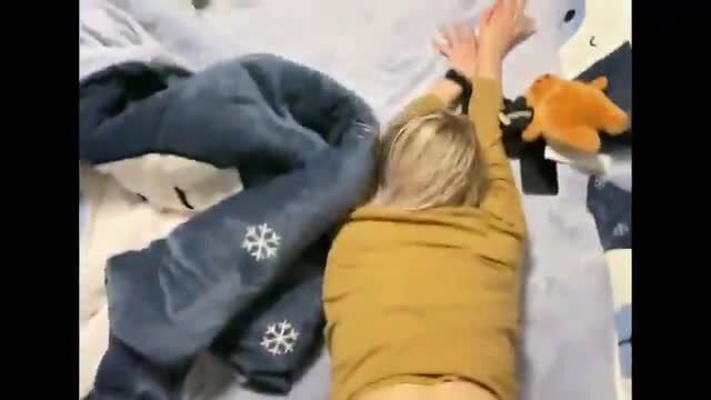 Hot blonde BBW amateur on bed, hands bound, teddy bear nearby