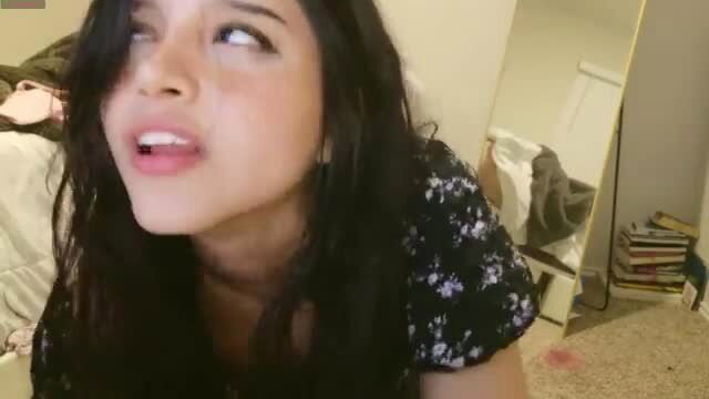 Elisparadisex hot teen brunette teases with tongue out closeup