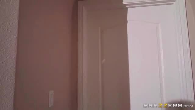 Busty Latina August Taylor in tight white dress by door