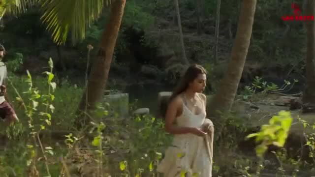Radhika Apte in white dress by river, nude intimacy scene
