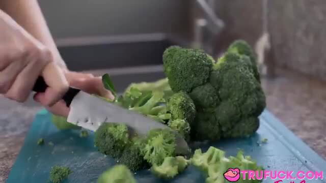 Christie Stevens cutting broccoli in kitchen, naughty stepmom prank