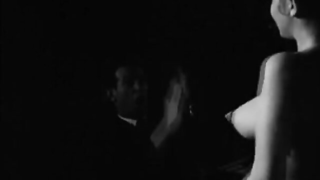 Nude woman with jiggling pasties teases suited man in erotic closeup