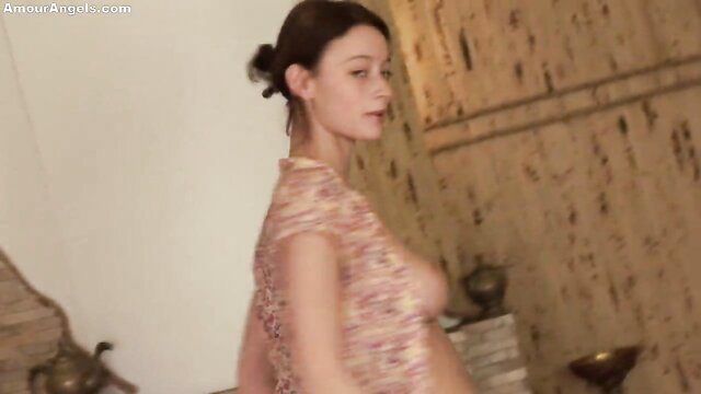 Solo Nastya striptease in sheer floral top, big tits tease