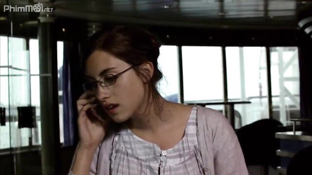 Redhead teen girl in glasses on phone in passionate scene