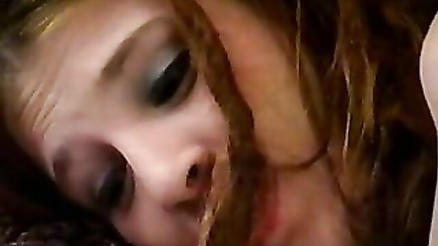 Closeup of hairy ginger girl's ecstatic face during intense sex