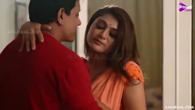 Hot Indian bimbo in orange saree embraced by man, horny closeup