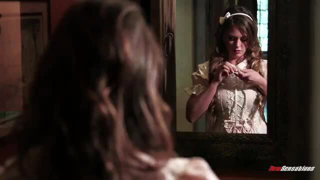 Alice Lighthouse in sexy lace dress adjusting necklace mirror tease