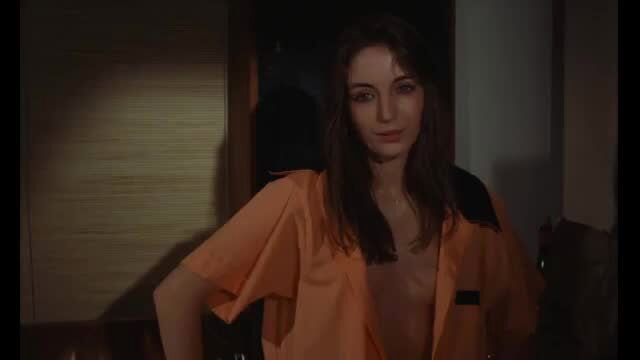 Christine Pascal nude in orange prison jumpsuit, Spoiled Children 1977