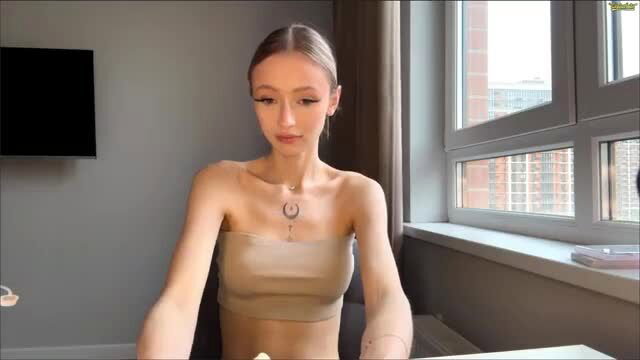 Skinny seasonhamiss in tube top on webcam, teasing solo