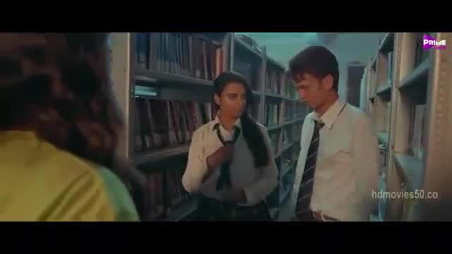 Indian college girl in school uniform flirts with guy in library