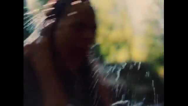 Paula Kober naked wet look outdoors blurred closeup
