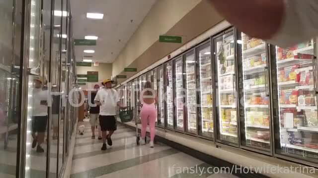 Hotwife Katrin in tight pink bodysuit at supermarket, teasing outdoors