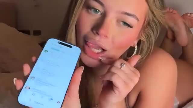 Taliavaine sexy blonde showing phone topless feet up
