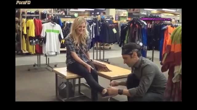 Blonde teen gets foot worship from guy in public store