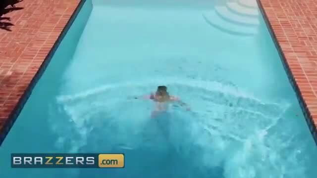 Jessa Rhodes swims in pool wearing pink bikini, Brazzers watermark