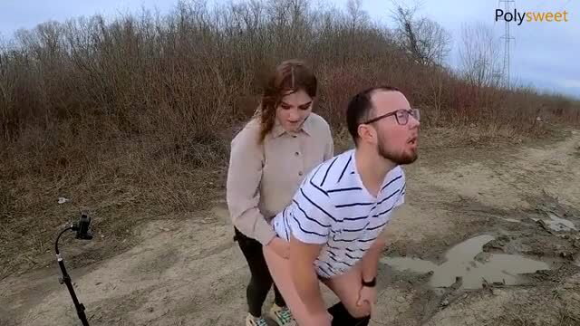 Russian girl pegs guy outdoors, feeds him cum from strapon