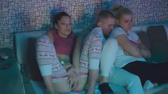 Three teens cuddling intimately on couch in wild threesome preview