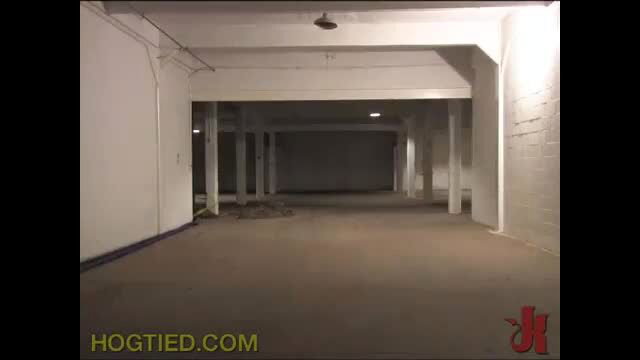 Empty industrial warehouse room in Hogtied bondage video