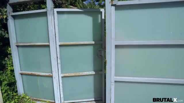 Riley Star bent over outdoor frosted glass gate, hot blonde ass out