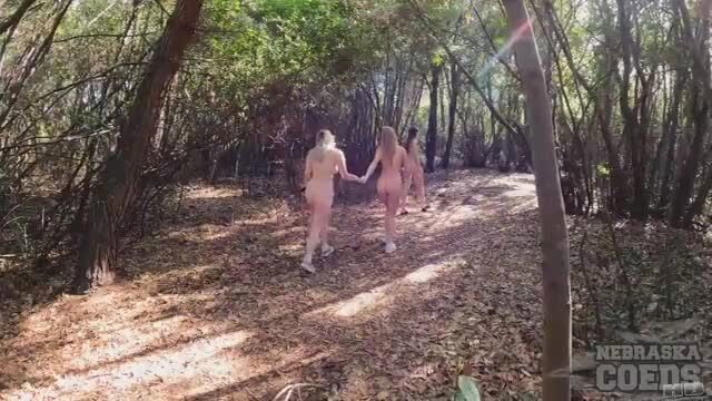 Teen hotties Kristina & Melonie nude walking hand-in-hand in steamy forest
