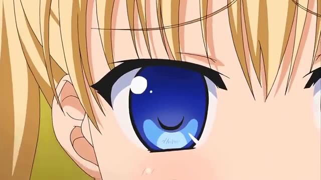 Close-up of blue-eyed blonde anime girl's seductive gaze in Oni Chichi hentai