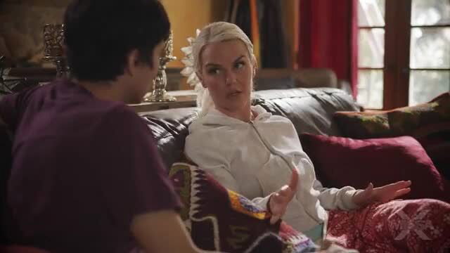 Slimthick Vic kinky mom in hoodie chats with guy on couch