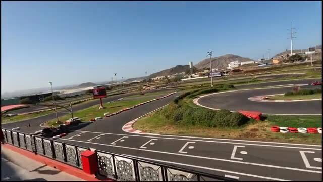 NatandGeorge at sunny outdoor go-kart track, fun couple vlog view