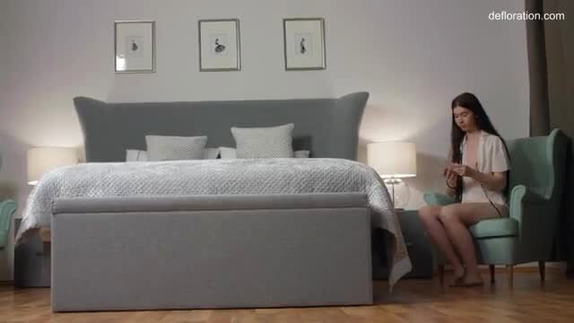 Teen virgin Anna Klavkina knits in lingerie on bed